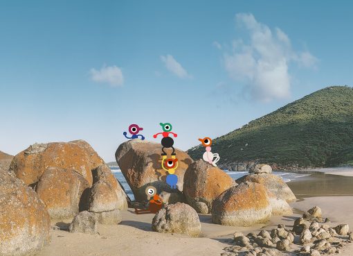 Big Walk characters exploring a sunny beach filled with large rocks