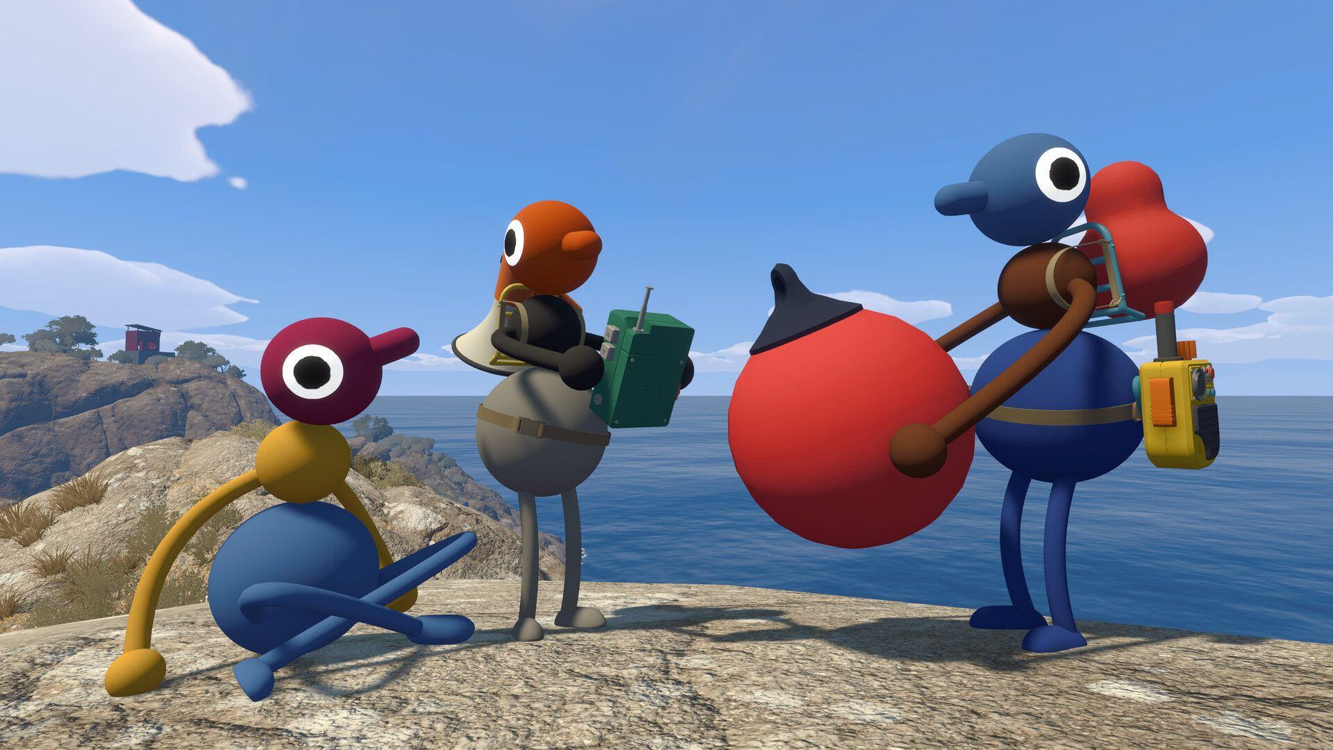 Three Big Walk characters standing on a rocky clifftop overlooking the ocean on a sunny day, one holding a green device and another a large red object