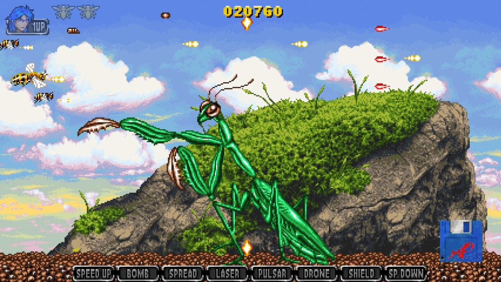 Apidya' Special gameplay showing the bee protagonist facing a giant praying mantis boss in the Meadow world, with grassy cliffs and blue sky in the background