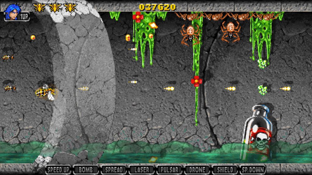 Apidya' Special sewer cave gameplay showing the bee fighting through a dark cavern with giant spiders, green slime, and a skull in a glass jar