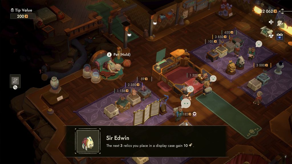 Will manages relic displays and customers inside his Moonlighter 2 shop