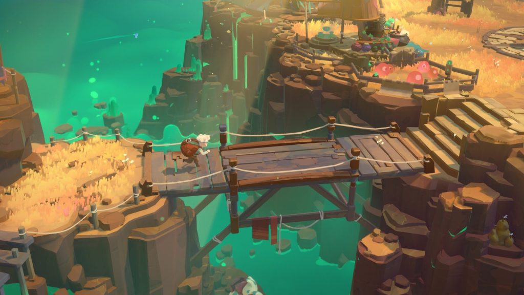 Will crosses a bridge above a glowing green chasm in Moonlighter 2