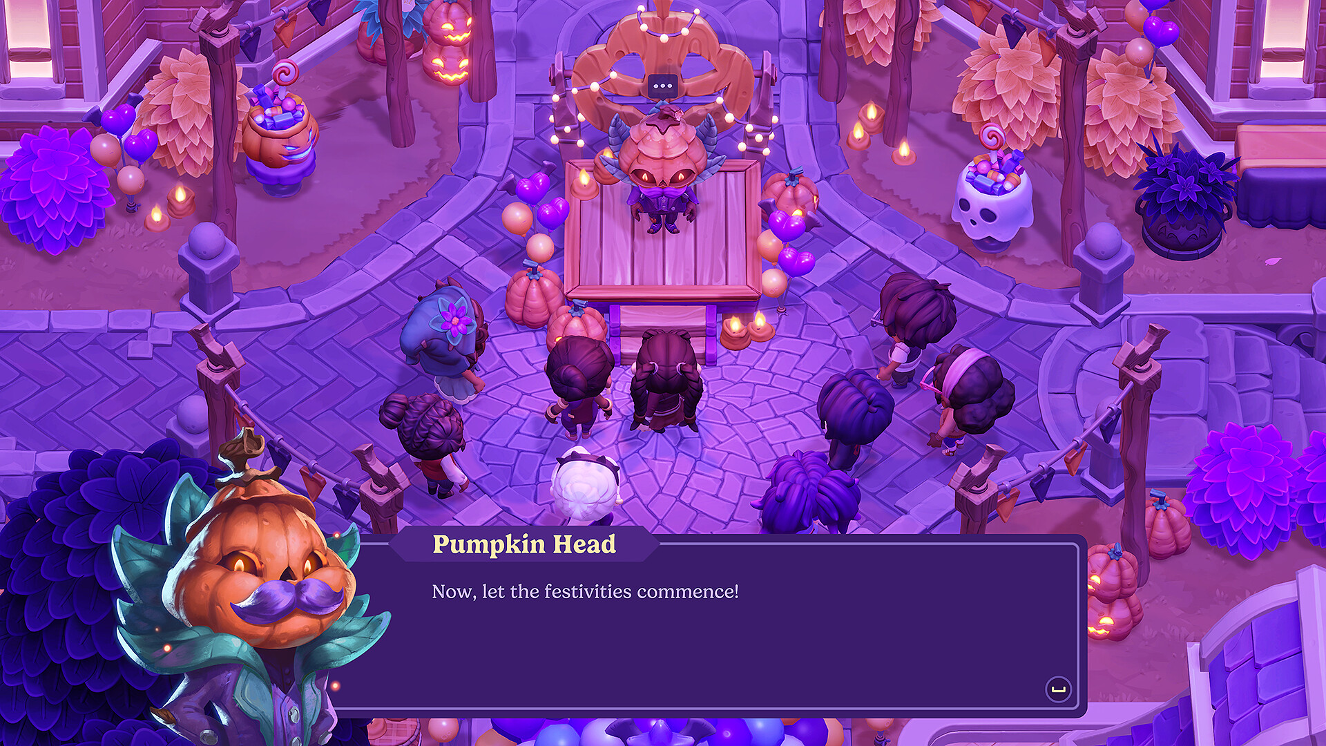 A town square decorated for a Halloween festival with a large pumpkin-headed figure on stage addressing a crowd